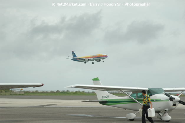 Air Jamaica Airline - Landing & Take Off - MBJ Airports Limited - Sangster International Airport - Domestic Terminal - Montego Bay, St James, Jamaica W.I. - MBJ Limited - Transforming Sangster International Airport into a world class facility - Photographs by Net2Market.com - Negril Travel Guide, Negril Jamaica WI - http://www.negriltravelguide.com - info@negriltravelguide.com...!