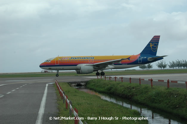 Air Jamaica Airline - Landing & Take Off - MBJ Airports Limited - Sangster International Airport - Domestic Terminal - Montego Bay, St James, Jamaica W.I. - MBJ Limited - Transforming Sangster International Airport into a world class facility - Photographs by Net2Market.com - Negril Travel Guide, Negril Jamaica WI - http://www.negriltravelguide.com - info@negriltravelguide.com...!