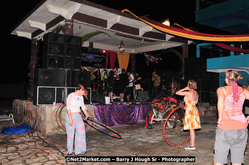 Chinese New Year @ The Sunset Show at Negril Escape - Tuesday, January 27, 2009 - Live Reggae Music at Negril Escape - Tuesday Nights 6:00PM to 10:00 PM - Photographs by Net2Market.com - Barry J. Hough Sr, Photographer/Photojournalist - Negril Travel Guide, Negril Jamaica WI - http://www.negriltravelguide.com - info@negriltravelguide.com...!