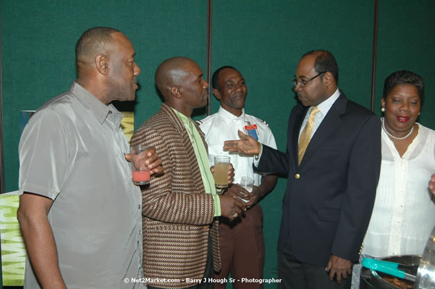 Red Cap Porters Awards - Minister of Tourism, Hon. Edmund Bartlett - Director of Tourism, Basil Smith - Friday, December 14, 2007 - Holiday Inn Sunspree, Montego Bay, Jamaica W.I. - Photographs by Net2Market.com - Barry J. Hough Sr, Photographer - Negril Travel Guide, Negril Jamaica WI - http://www.negriltravelguide.com - info@negriltravelguide.com...!