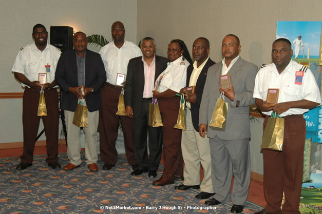 Red Cap Porters Awards - Minister of Tourism, Hon. Edmund Bartlett - Director of Tourism, Basil Smith - Friday, December 14, 2007 - Holiday Inn Sunspree, Montego Bay, Jamaica W.I. - Photographs by Net2Market.com - Barry J. Hough Sr, Photographer - Negril Travel Guide, Negril Jamaica WI - http://www.negriltravelguide.com - info@negriltravelguide.com...!