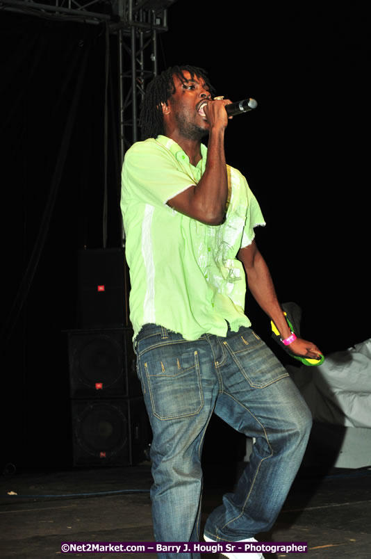 Usain Bolt of Jamaica - The Fastest Man In The World  - Usain Bolt Homecoming Celebrations Concert at the William Knibb High School Play Field, Trelawny - Ice, Ding Dong, Ravers Clavers, D'Angel, Voicemail, RDX and Dancers, Wayne Marshall, Tammi Chynn, Bugle, Nero, Tanya Stephens, Richie Spice, Kip Rich,and Shaggy - Photographs by Net2Market.com - Barry J. Hough Sr. Photojournalist/Photograper - Photographs taken with a Nikon D300 - Negril Travel Guide, Negril Jamaica WI - http://www.negriltravelguide.com - info@negriltravelguide.com...!