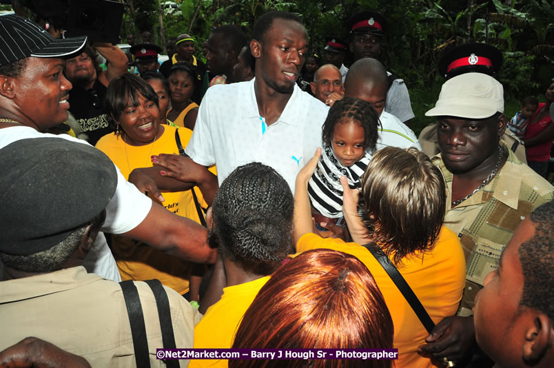 Usain Bolt of Jamaica - The Fastest Man In The World  - Usain Bolt Homecoming Celebrations - Press Conference at the Grand Bahia Principe &amp; Sherwood Content - Waldensia Primary School - Photographs by Net2Market.com - Barry J. Hough Sr. Photojournalist/Photograper - Photographs taken with a Nikon D300 - Negril Travel Guide, Negril Jamaica WI - http://www.negriltravelguide.com - info@negriltravelguide.com...!